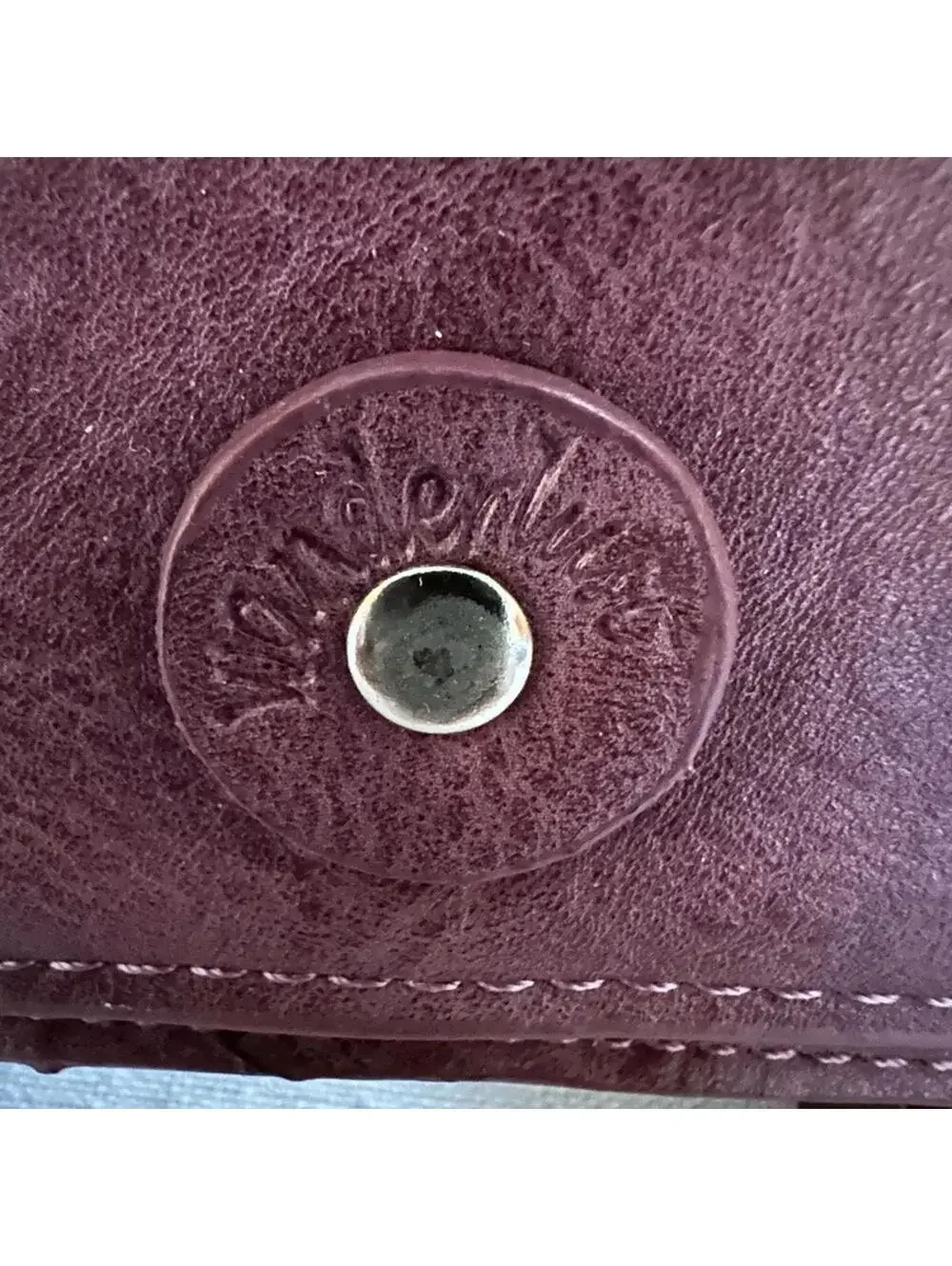 Vintage Wanderlust burgundy leather passport / travel wallet with plaid lining.